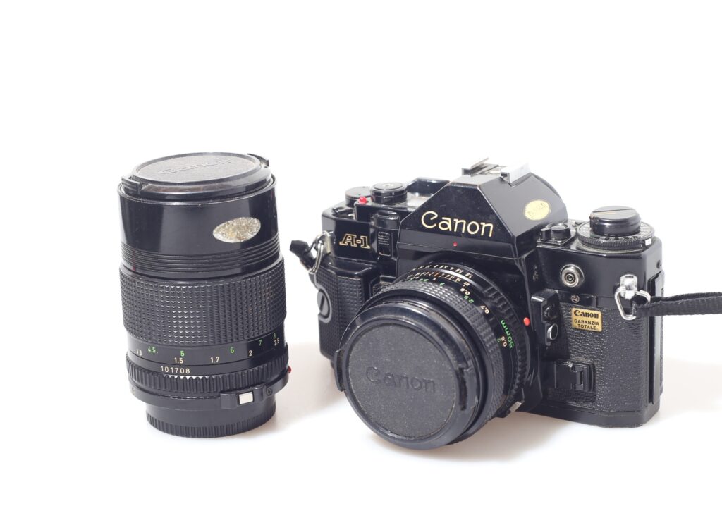 FOTOCAMERA ANALOGICA CANON A-1 + 50 1.8 + 135 2.8.